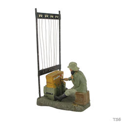 Lineol Signals soldier sitting, with telephone switchboard