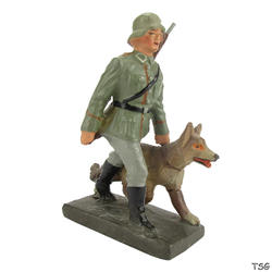 Lineol Signals soldier walking, with dog